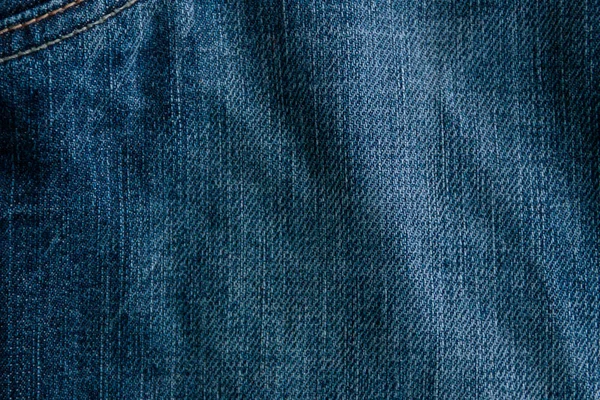 Jeans fundo textura. Parte do jeans azul — Fotografia de Stock