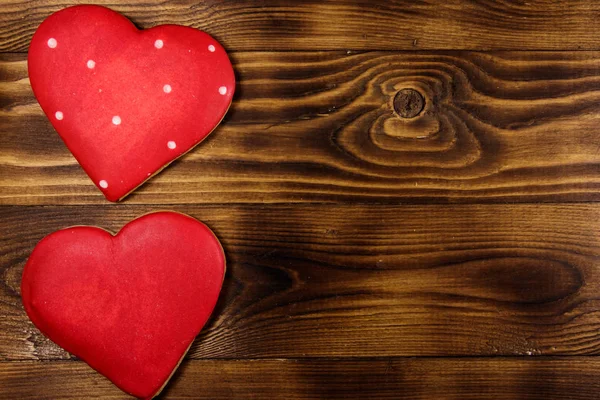 Heart shaped cookies for valentine day on wooden table. Top view — Stock Photo, Image