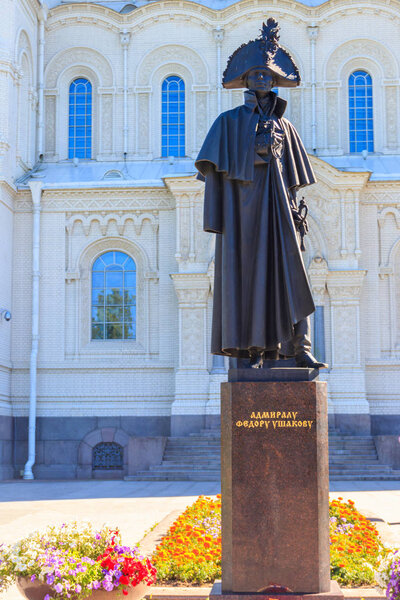 Monument to russian admiral Fyodor Ushakov in front of the Naval cathedral of St. Nicholas in Kronstadt, Russia. Inscription: To Admiral Fyodor Ushakov