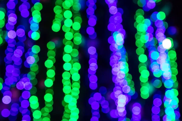 Sfondo astratto. Sfocato cerchi colorati bokeh di luci di Natale — Foto Stock