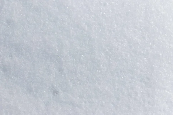 Textura de la nieve blanca. Fondo de invierno — Foto de Stock