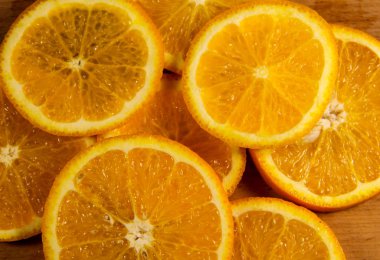 Dilimlenmiş sulu portakal meyvelerinin arka planı