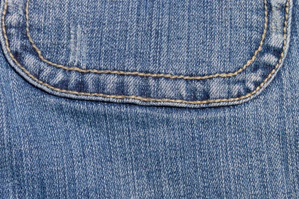 Jeans fundo textura. Parte do jeans azul — Fotografia de Stock