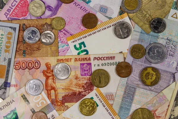 Hintergrund von Banknoten und Münzen aus verschiedenen Ländern — Stockfoto