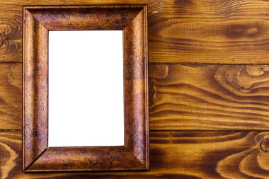 Ahşap arka planda boş fotoğraf çerçevesi. Üst görünüm