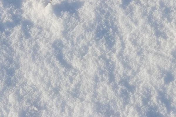 Textura de la nieve blanca. Fondo de invierno —  Fotos de Stock