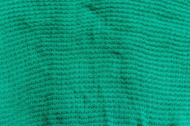 Yeşil örgü doku. Örme kumaş arka plan