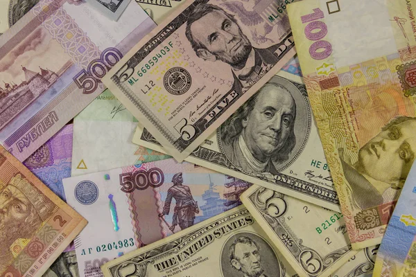 Víceúčelové zázemí amerických dolarů, ruských rublů a ukrajinských hřiven — Stock fotografie