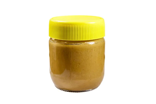 Glas Erdnussbutter isoliert auf weißem Hintergrund — Stockfoto