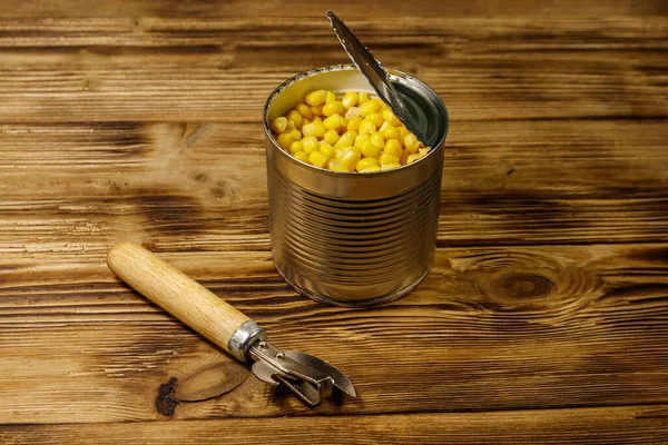 Open Tin Can Corn Can Opener Wooden Table — Stock Photo, Image