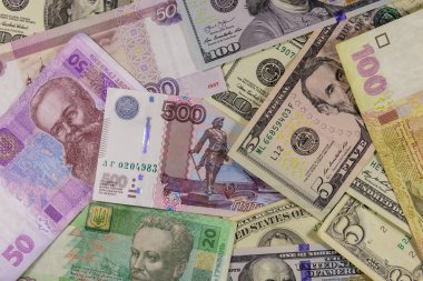 Amerikan dolarlarının, Rus rublelerinin ve Ukrayna Hryvnialarının çok yönlü geçmişi