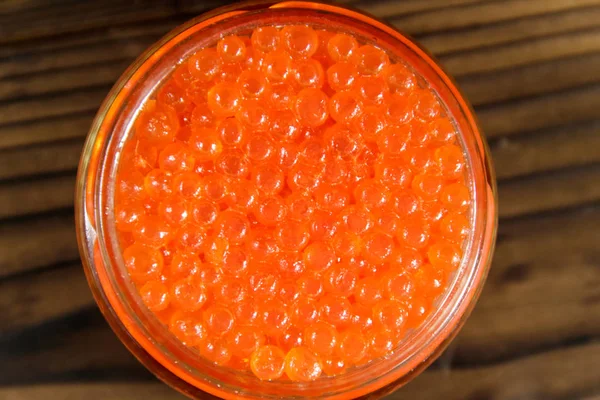 Caviar Vermelho Jarra Vidro Mesa Madeira Vista Superior — Fotografia de Stock