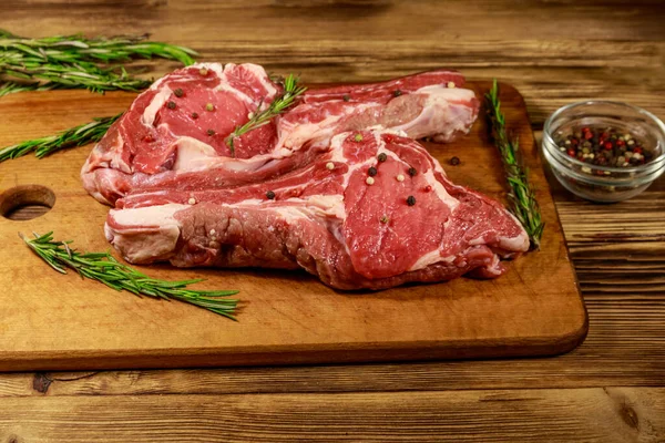 Raw Fresh Beef Rib Eye Steaks Bone Spices Rosemary Wooden — Stock Photo, Image