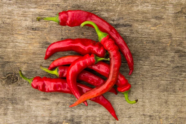 Red Hot Chili Peppers Rustic Wooden Table Top View — Stock Photo, Image
