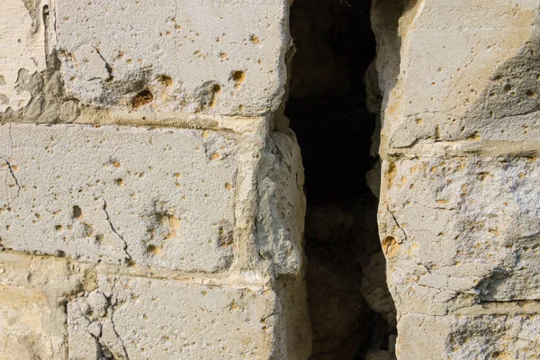 Big fissure in a house brick wall