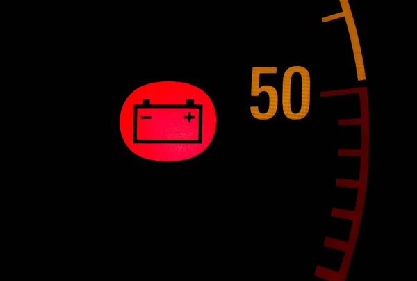 Battery low red light icon on car dashboard — Stock Photo, Image
