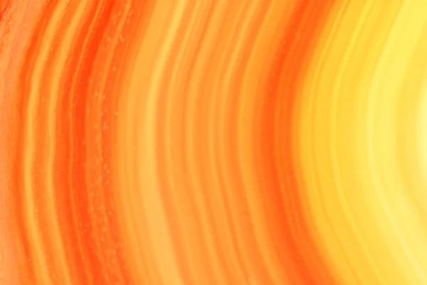 Abstrakter Hintergrund - orangefarbener Achat Mineralschnitt — Stockfoto