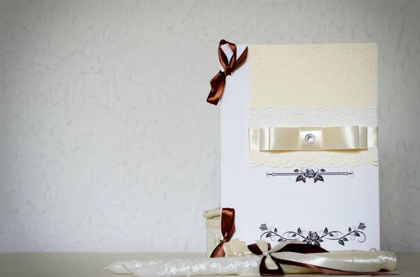 White wedding card with ribbons and place for text
