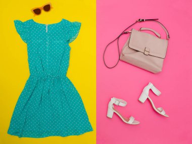 Nane yeşili elbise, çanta, beyaz ayakkabı ve gül gözlük. Parlak pembe-sarı arka plan. Moda kavramı
