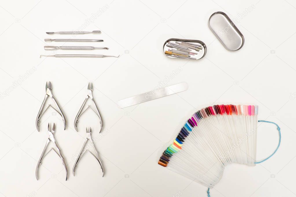 Set for manicure. Tools, palette, care products. White background. Space for text