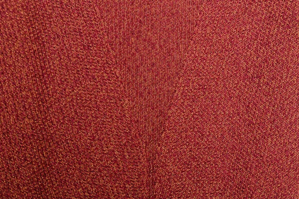 Red orange texture. Knitted fabric with pattern — Stock Photo, Image