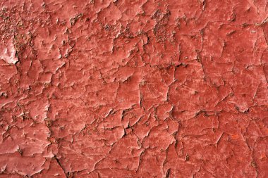 Paslı kırmızı boya çatlamış. Kusursuz eski doku arkaplanı