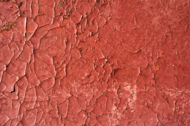 Paslı kırmızı boya çatlamış. Kusursuz eski doku arkaplanı