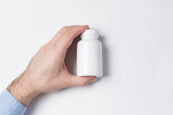 Botella Plástico Blanco Mano Masculina Paquete Medicamentos Maqueta Plástico —  Fotos de Stock