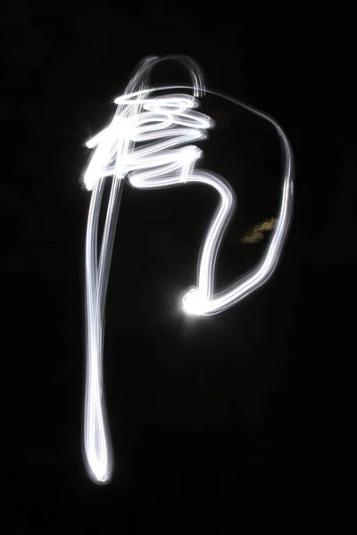 Padrão de luz abstrato no fundo preto — Fotografia de Stock