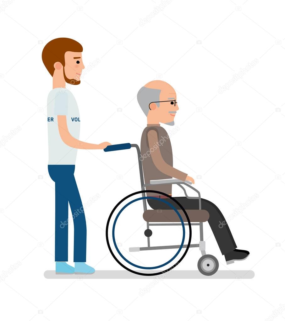 A young volunteer carries an elderly man on a wheelchair.
