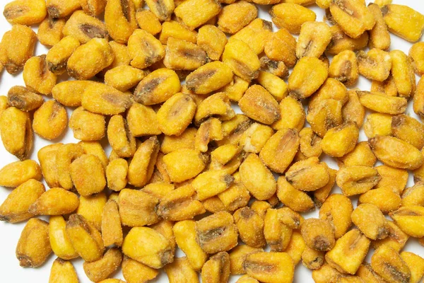 Roasted corn nuts on white background