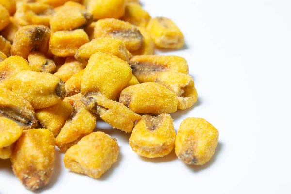 Roasted corn nuts on white background