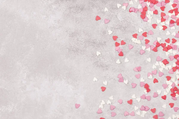 Pink, white and red hearts on a light background. Top view, copy space. Toning — Stock Photo, Image