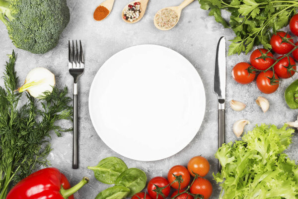 Concept dietary and vegetable food. White plate. Various vegetab