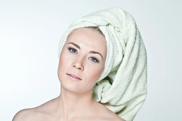 Portrait of a girl in a towel — Stock Photo, Image