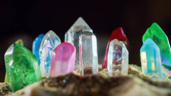 Multicolored Crystal Quartz Sticks Gems Protrude Sand — Stock Photo, Image