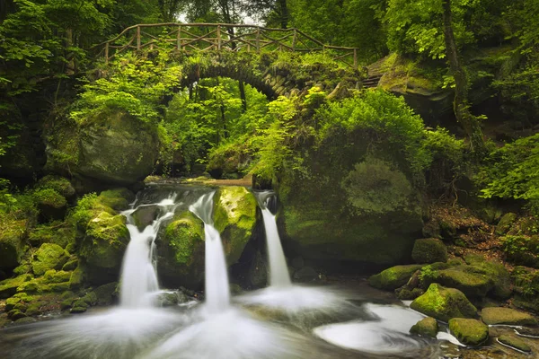 Stone bridge and waterfall in Luxembourg — Stock Photo, Image