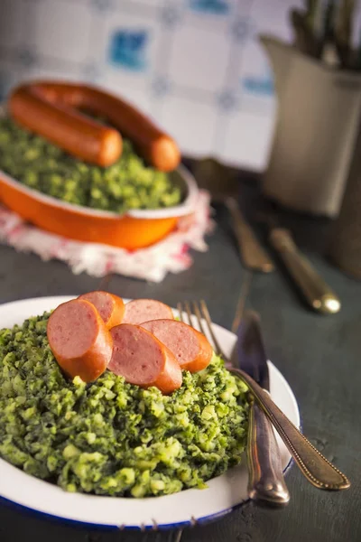 Dutch food: kale with smoked sausage or 'Boerenkool met worst' — Stok fotoğraf