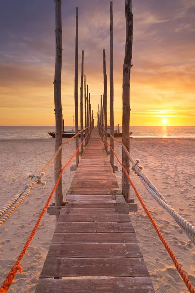 Seaside jetty at sunrise on Texel island, The Netherlands