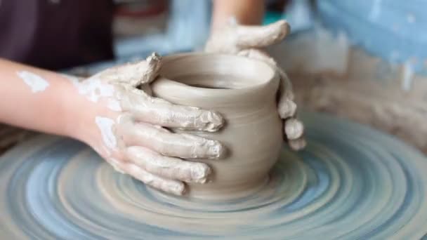 Man Starts to Mold a Vase on a Pottery Wheel Worker is Making a Pot