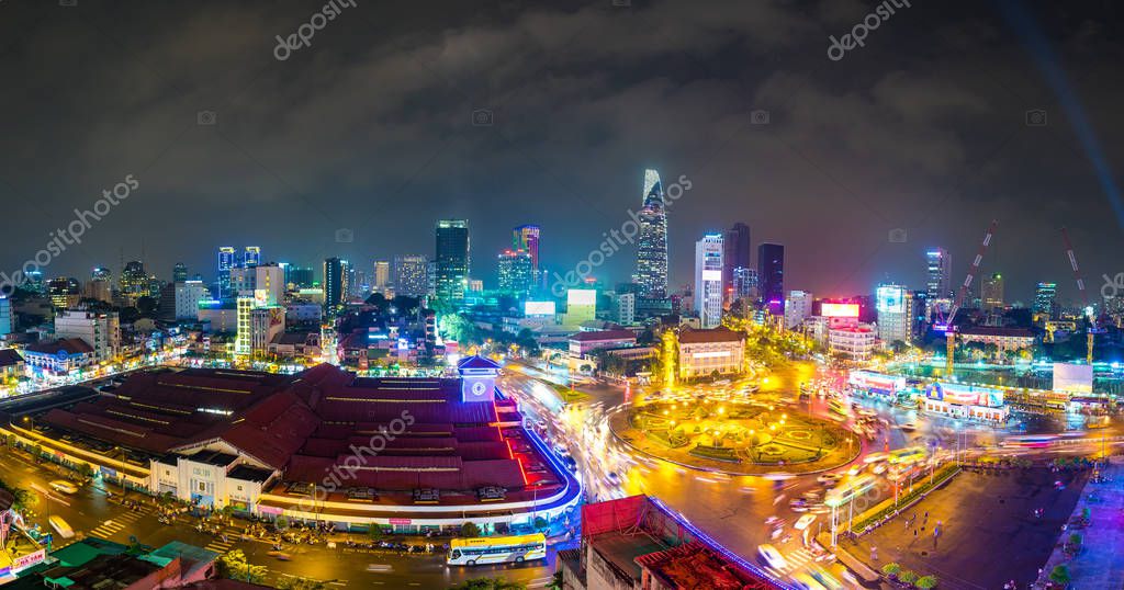 HO CHI MINH, VIETNAM - MARCH 11 2016: Impression, colorful, vibrant scene of traffic, dynamic, crowded city on street, Quach Thi Trang roundabout at Ben Thanh market.