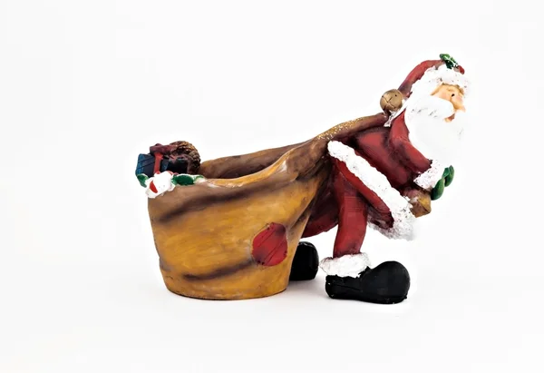 Kerámia figura, Santa Claus, egy nagy zsák, elszigetelt — Stock Fotó