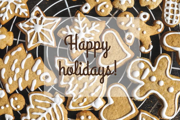 Christmas gingerbread cookies and inscription on a dark backgrou — Stock Photo, Image