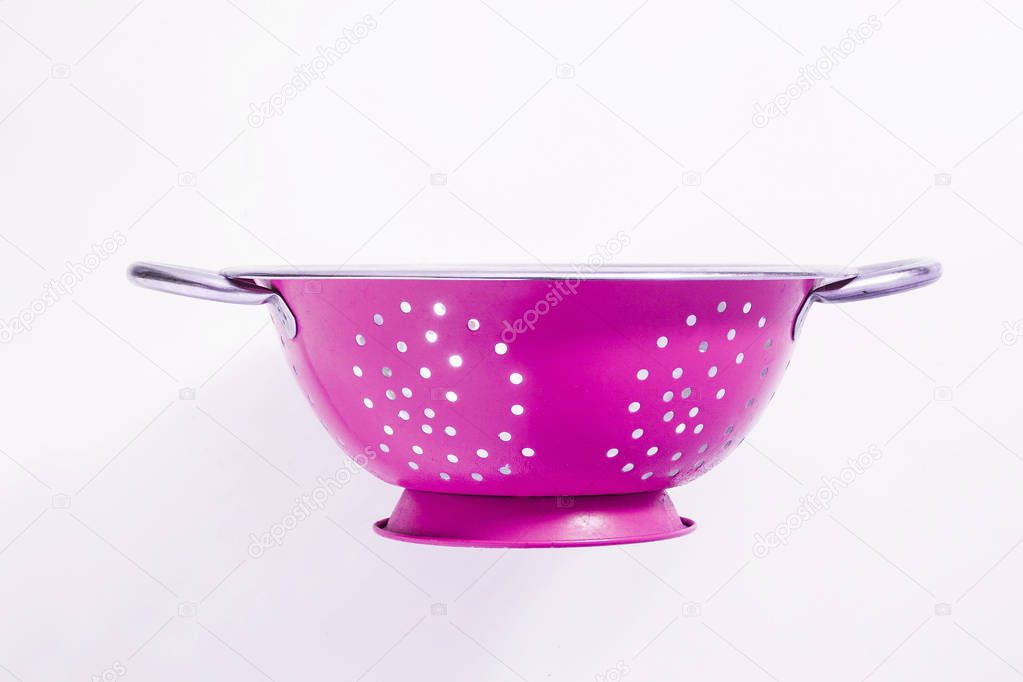 Old metal colander sieve isolated on white background