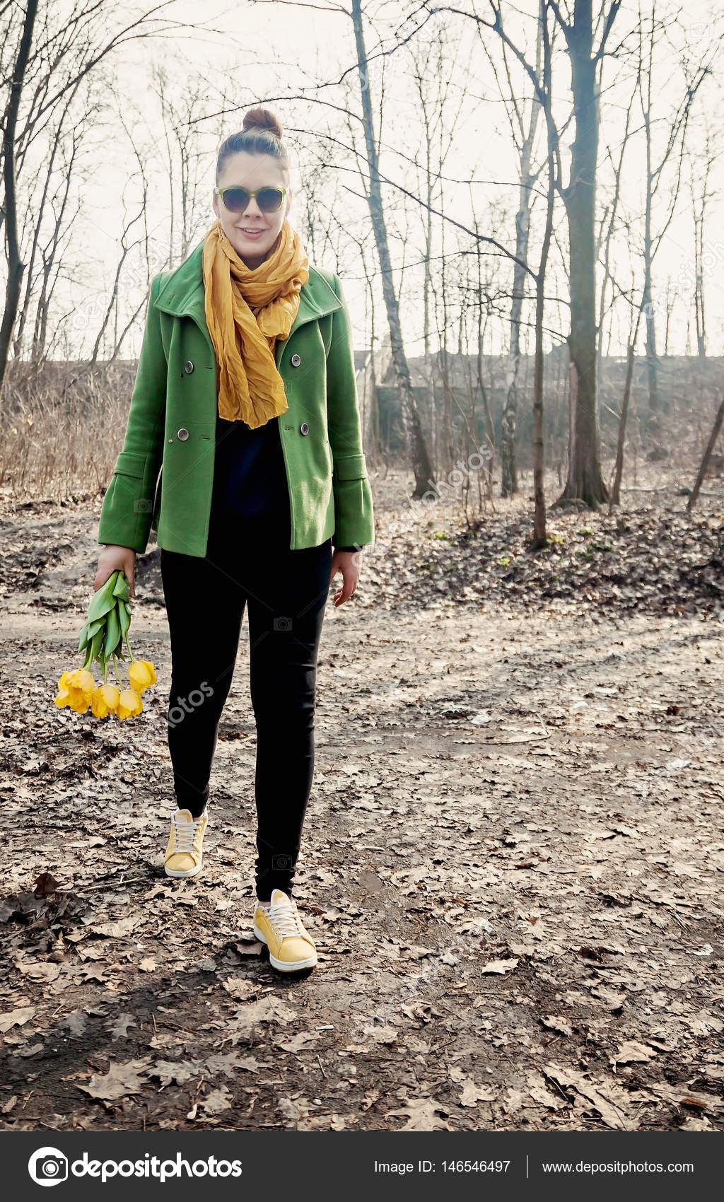 Young Adult Woman In A Sportive Bright Style Walking In The