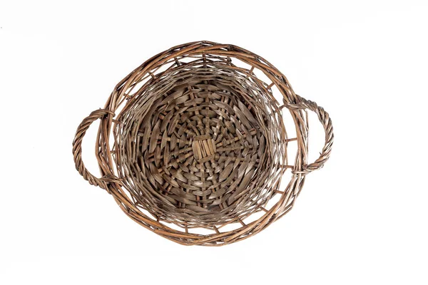 Top view of a wicker basket with handles, isolated — Stock Photo, Image