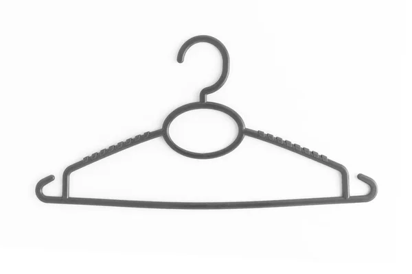Een gekleurde kunststof hanger, geïsoleerd op een witte achtergrond, sluiten- — Stockfoto