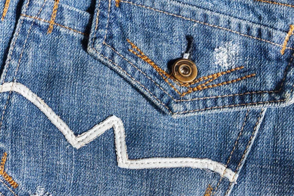 Jeans close-up, velho, bolso para trás, frente, amassado, ragged . — Fotografia de Stock