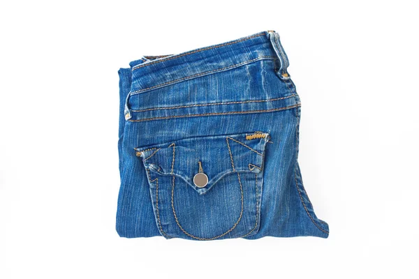 Hellblaue Retro Jeans fein säuberlich gefaltet, isoliert — Stockfoto