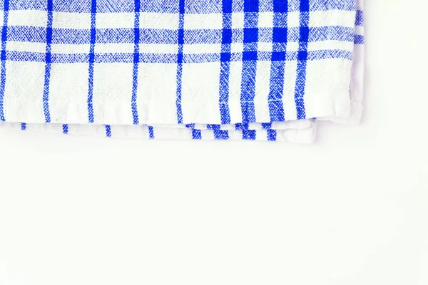 Blauwe doek, een keuken handdoek met een geruit patroon, op een wit — Stockfoto